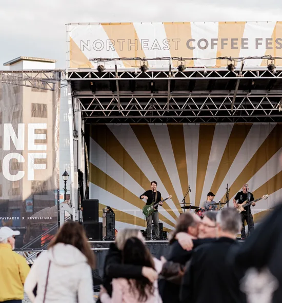 A band plays on NECF stage.