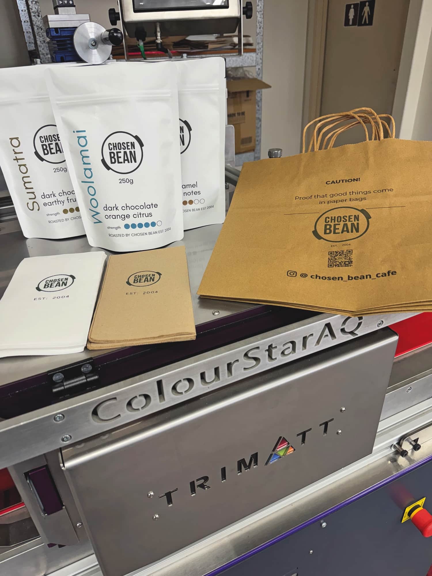 The ColourStar AQ can print on a range of café packaging items such as napkins, bags, and boxes.
